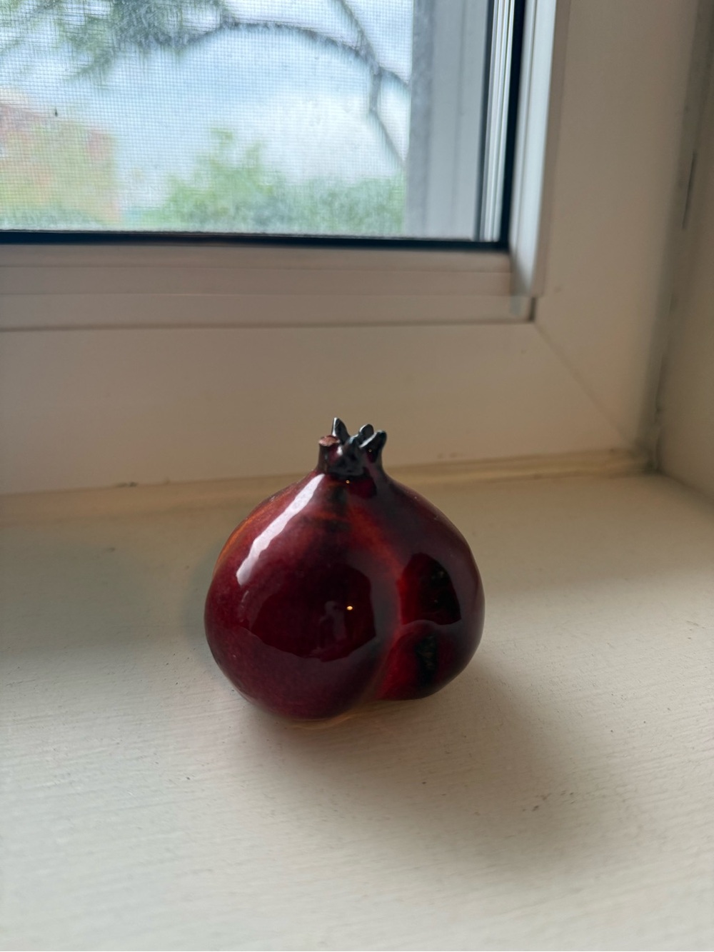 Clay pomegranate sculpture